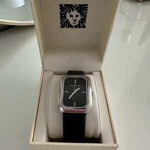 Anne Klein Women’s Vegan Strap Watch .